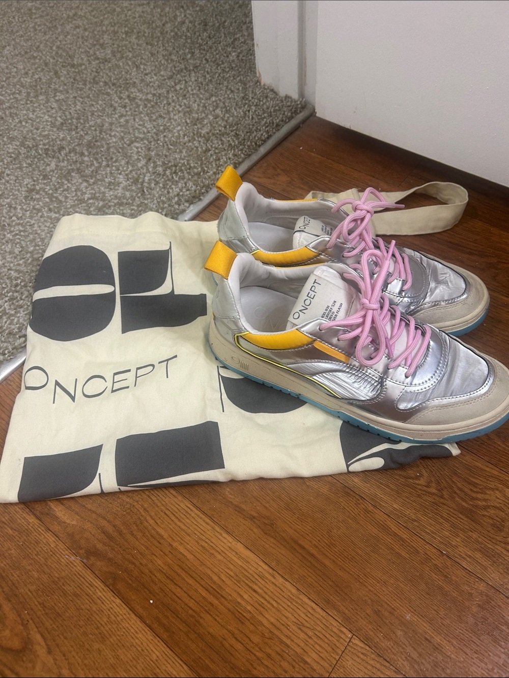 CONCEPT Women's Metallic Silver Sneakers with Yellow Accents and Pink Laces